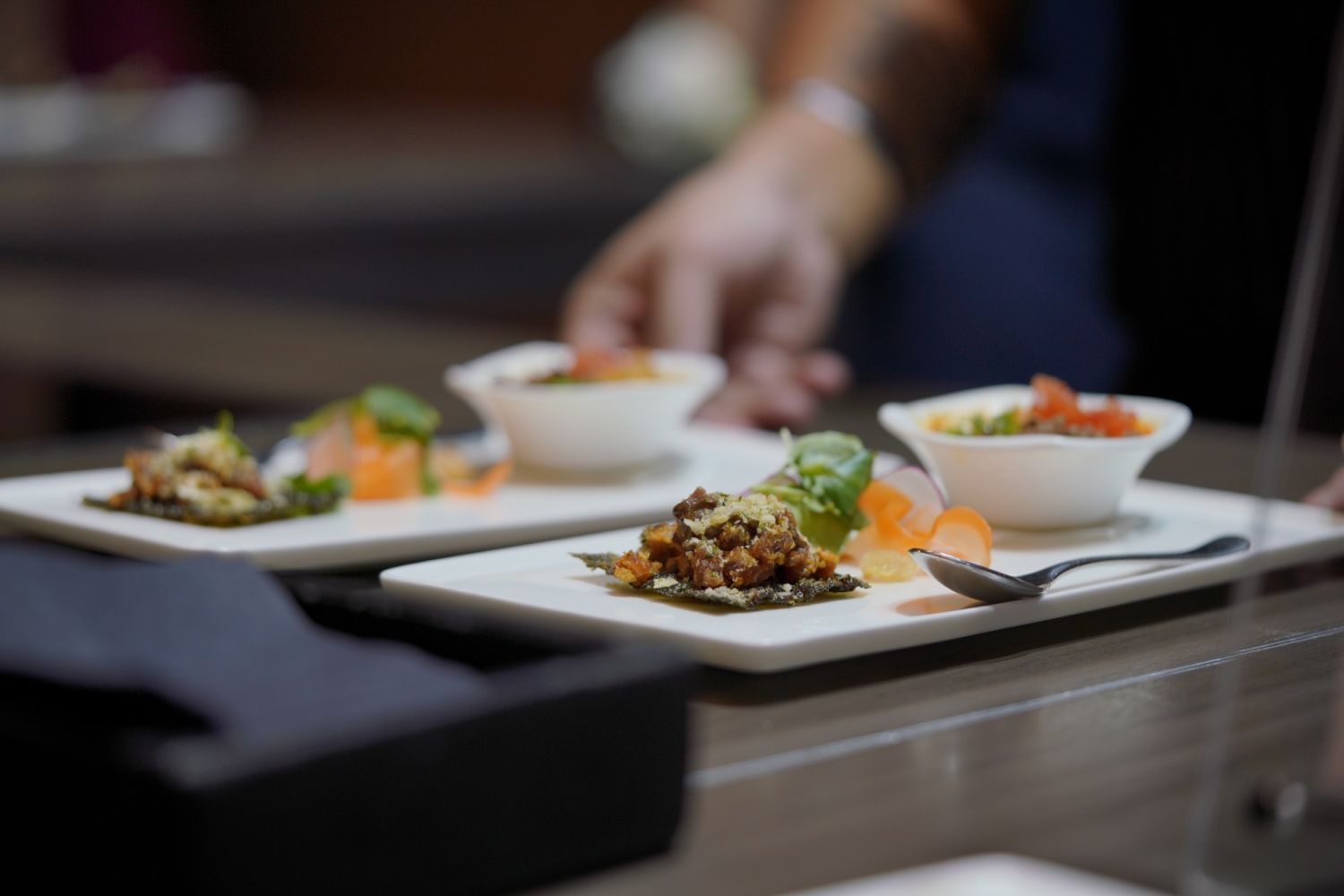 Off Menu Philippines 2022 - The kansi chawanmushi and ibérico presa nori taco all plated up and ready to be served