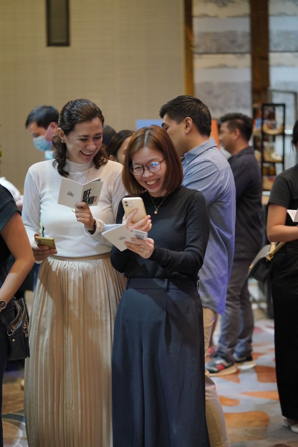 Off Menu Philippines 2022 - Guests browsing their Off Menu Passport—the key to enjoying the epicurean evening