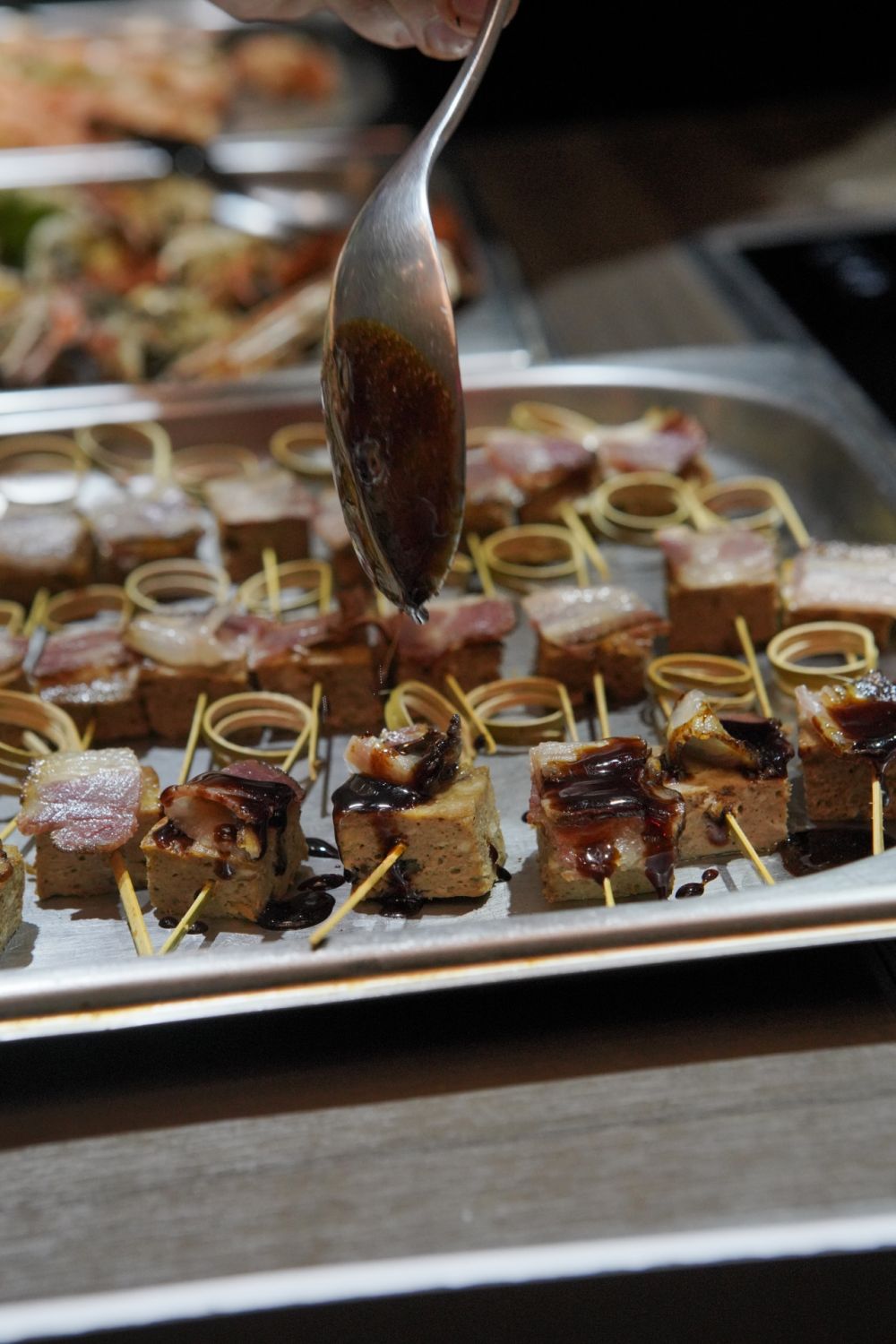 Off Menu Philippines 2022 - Skweers of eel and etag are finished with a delectable glaze