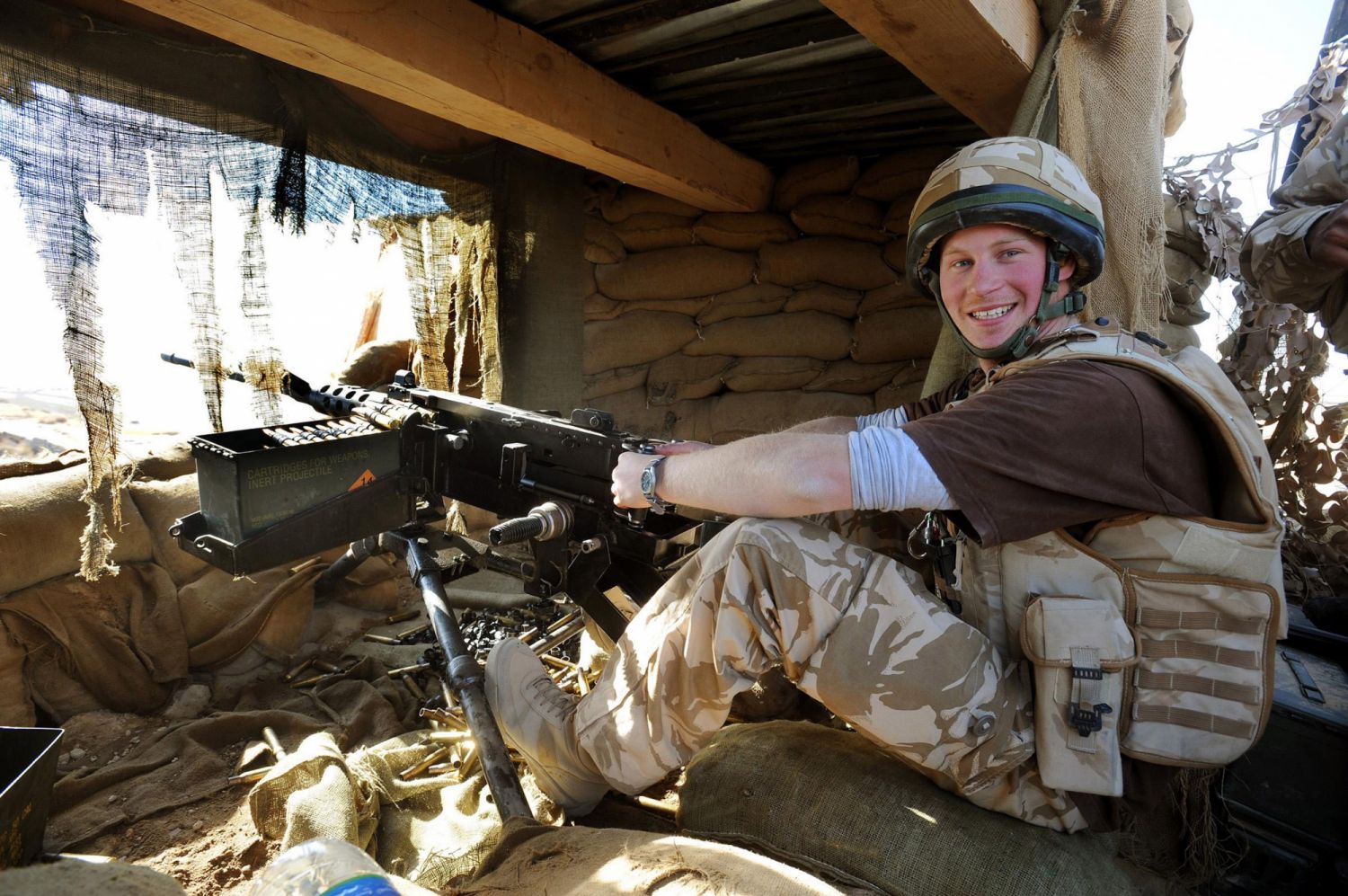 Prince Harry mans a 50mm machine gun in Afghanistan as the Pulsar G10 British military watch keeps time.  (Photo: John Stillwell - POOL/Anwar Hussein Collection/WireImage)