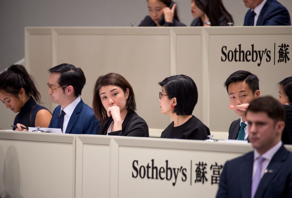 HONG KONG, CHINA - APRIL 02: Andy Warhol's screen print sells for $HKD86 million ($USD 11 068 200) at the Spring auction in the HKCEC Hong Kong, Hong Kong SAR, China on April 02, 2017. Andy Warhol's 'Mao' screen print comes up for auction at Sotheby's. (Photo by Jayne Russell/Anadolu Agency/Getty Images)