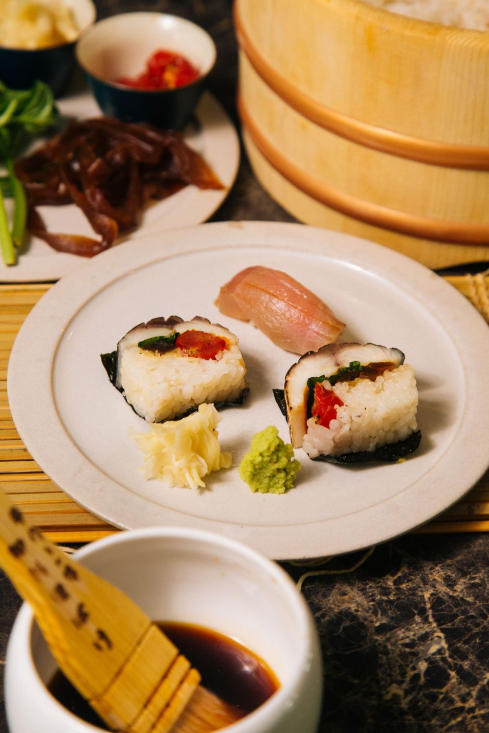 The Italian saba roll is served alongside a fresh Edo-mae style chu-toro nigiri