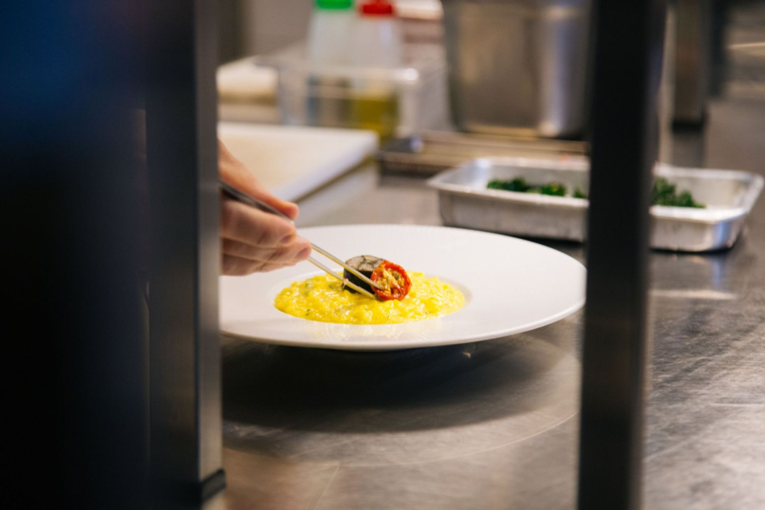 The saffron and crayfish risotto is topped with a crayfish terrine and garnished with fingerlime