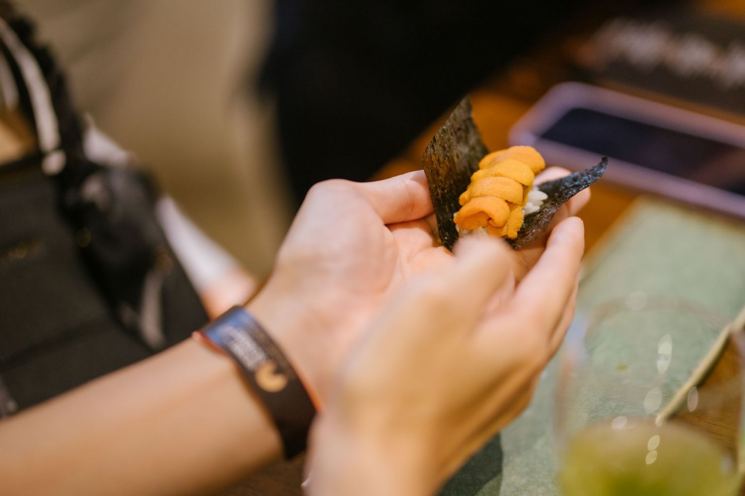 Yuko Suzuki's service included an uni course that she placed directly onto guests' hands