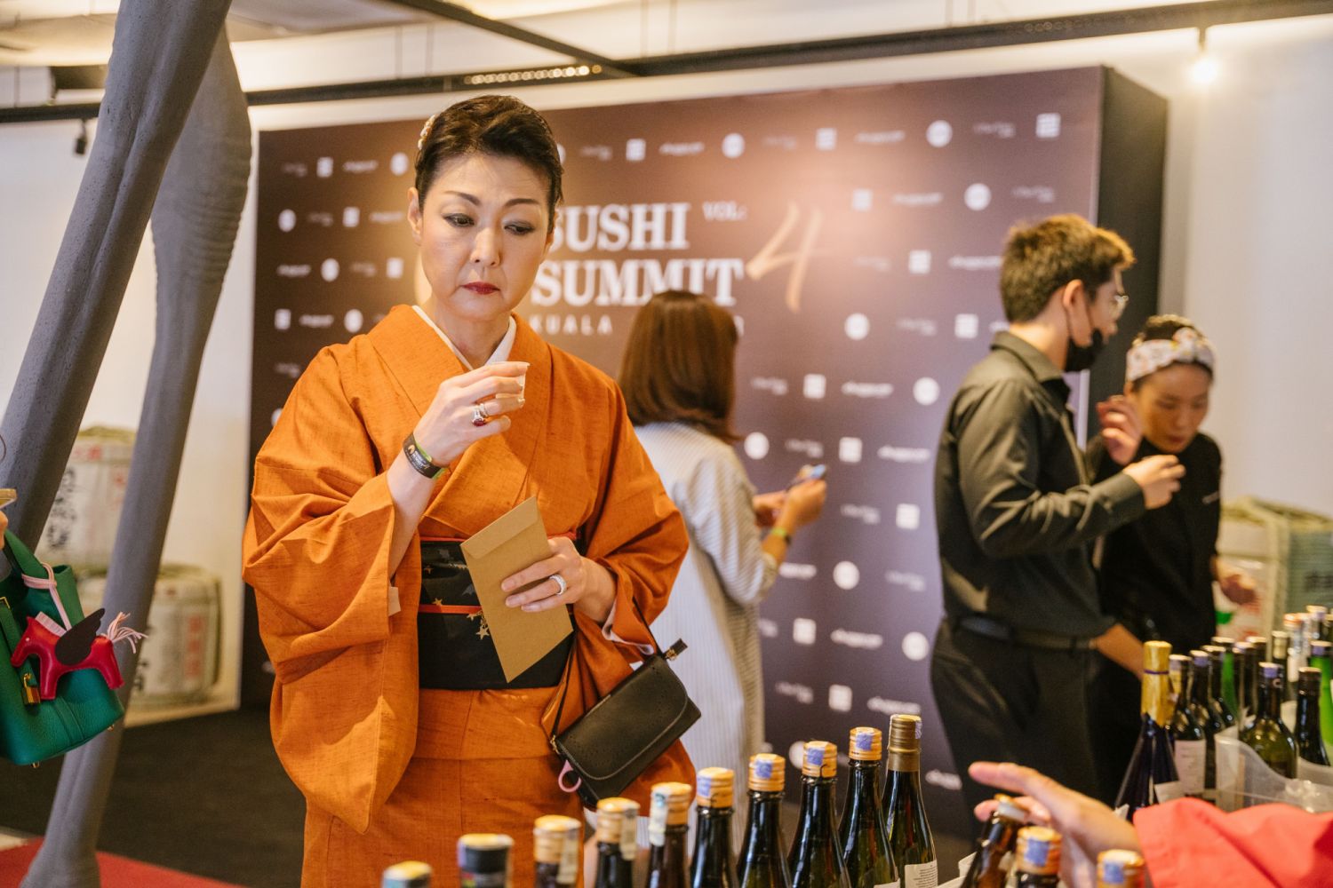 The event's sake specialist browsing through the selection