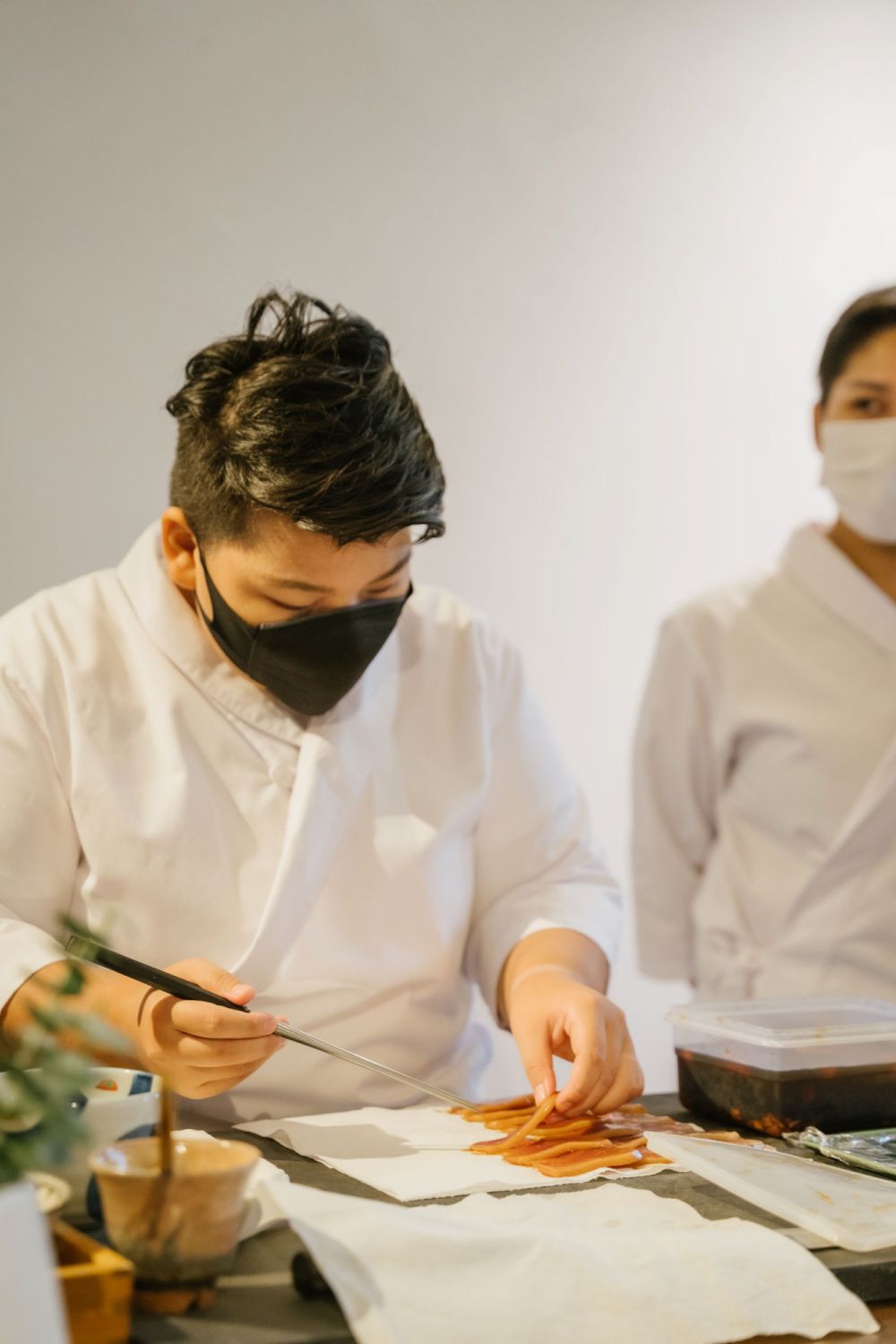 Haruka Hokune prepping her marinated buri (yellowtail)