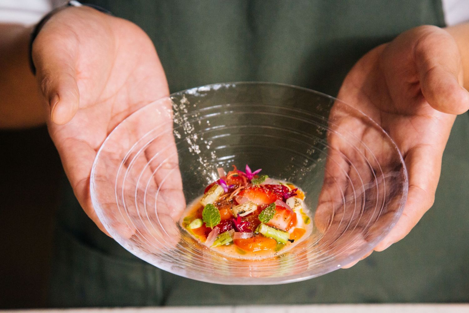 Low's apricot kernel tofu with strawberries, tomatoes, charred scallions, and chilli jam