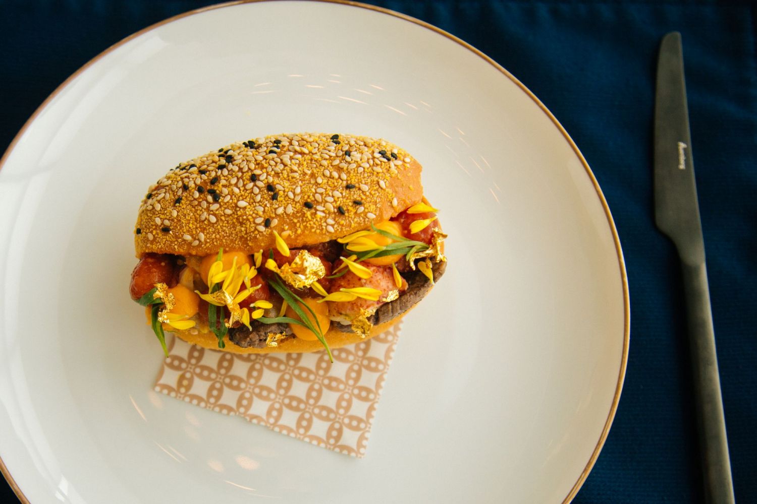Fedrighi's dish features fresh Boston lobster and juicy Australian steak