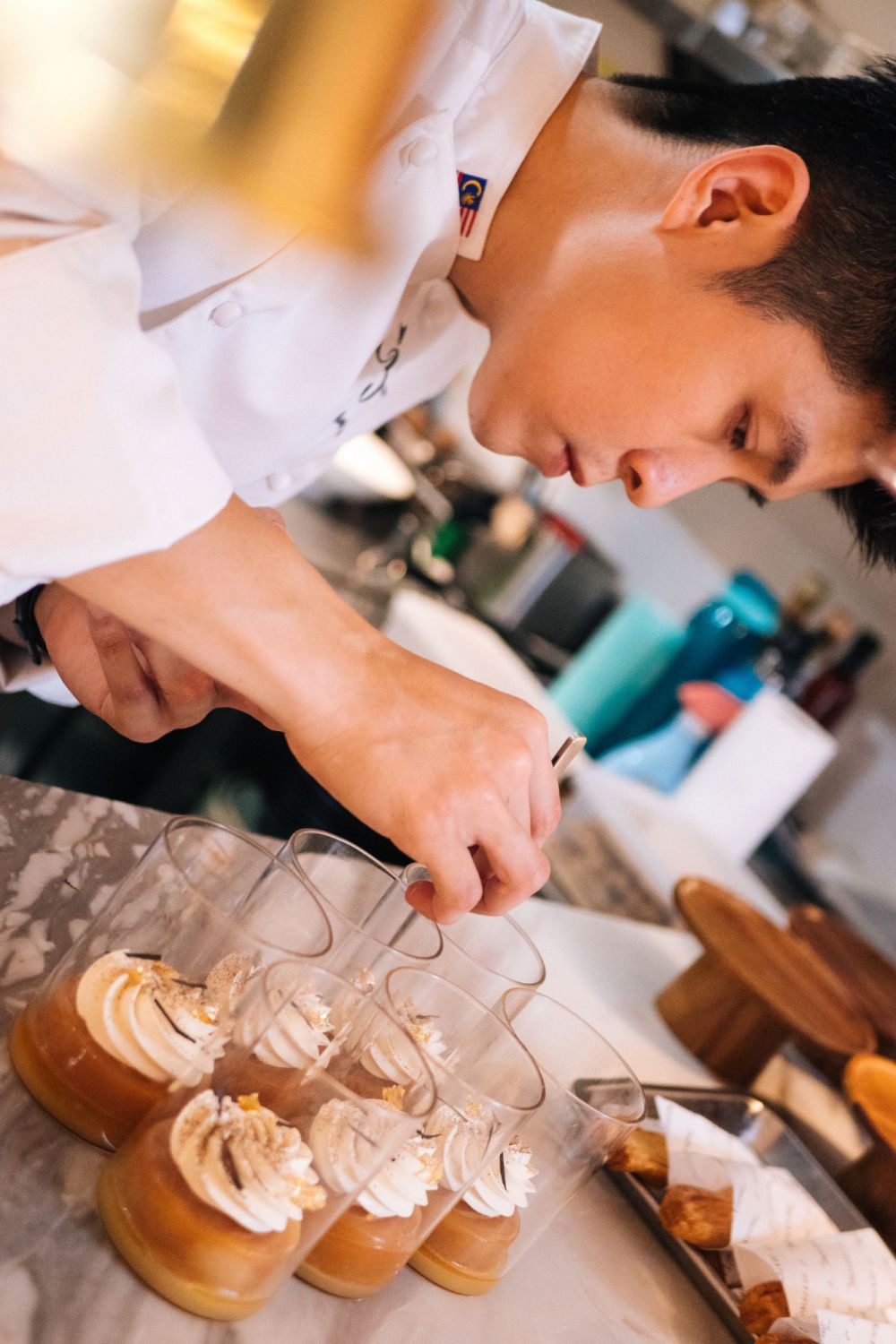 Chong putting the finishing touches on his dessert
