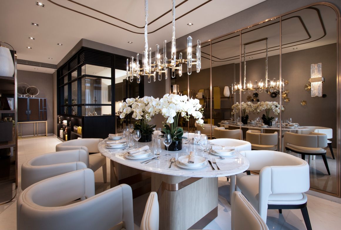 Tinted mirrored panels and champagne gold trimmings contribute to the home’s opulent appearance
