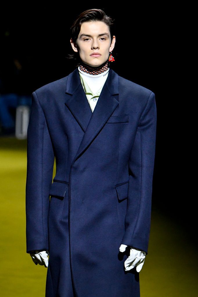 MILAN, ITALY - JANUARY 16: (NEW YORK TIMES OUT) Louis Partridge walks the runway during the Prada Ready to Wear Fall/Winter 2022-2023 fashion show as part of the Milan Men Fashion Week on January 16, 2022 in Milan, Italy. (Photo by Victor VIRGILE/Gamma-Rapho via Getty Images)