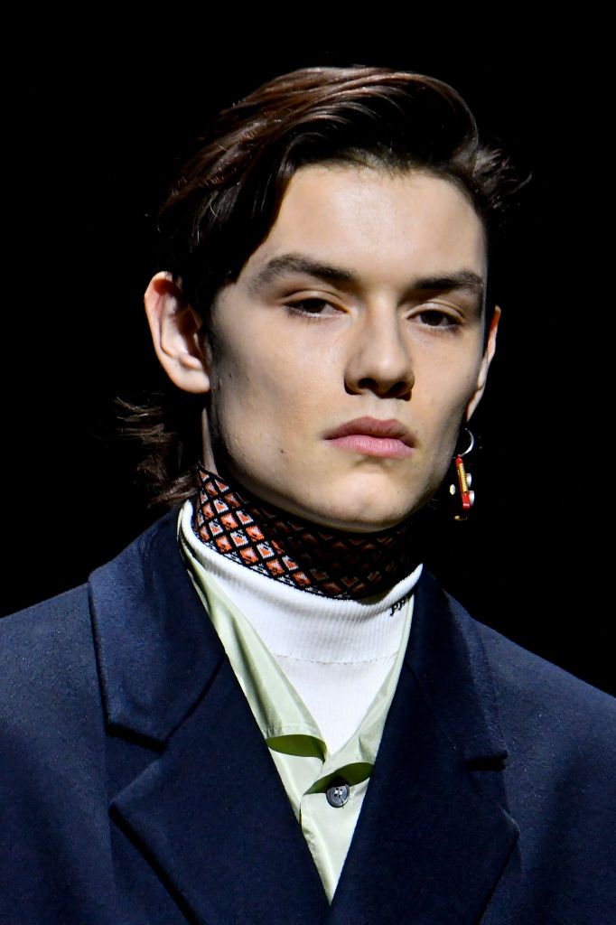 MILAN, ITALY - JANUARY 16: (NEW YORK TIMES OUT) Louis Partridge walks the runway during the Prada Ready to Wear Fall/Winter 2022-2023 fashion show as part of the Milan Men Fashion Week on January 16, 2022 in Milan, Italy. (Photo by Victor VIRGILE/Gamma-Rapho via Getty Images)