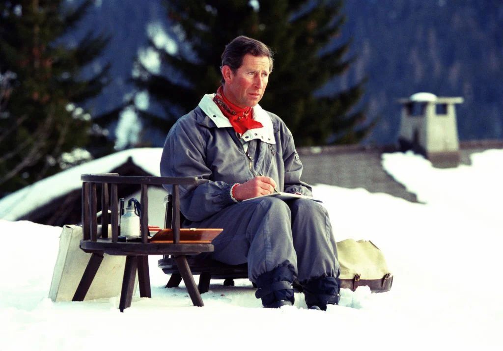 The then Prince Charles painting with watercolours in Klosters, Switzerland (Photo: courtesy of Julian Parker/UK Press via Getty Images)