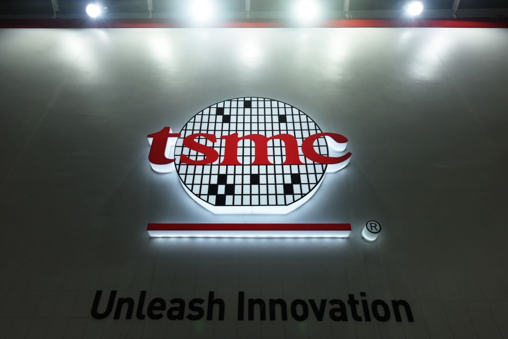 NANJING, CHINA - JUNE 09: A logo of Taiwan Semiconductor Manufacturing Company Limited (TSMC) is seen during 2021 World Semiconductor Conference at Nanjing International Expo Center on June 9, 2021 in Nanjing, Jiangsu Province of China. (Photo by Long Wei/VCG via Getty Images)