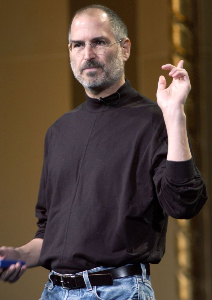 SAN JOSE, CA - OCTOBER 26: Steve Jobs of Apple Computer celebrates the release of a new Apple iPod family of products at the California Theatre on October 26, 2004 in San Jose California. (Photo by Tim Mosenfelder/Getty Images)