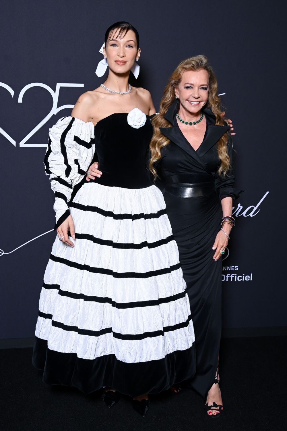 CANNES, FRANCE - MAY 25: Bella Hadid wearing Chopard and Caroline Scheufele attend the "Chopard Loves Cinema" Gala Dinner at Hotel Martinez on May 25, 2022 in Cannes, France. (Photo by Pascal Le Segretain/Getty Images For Chopard)