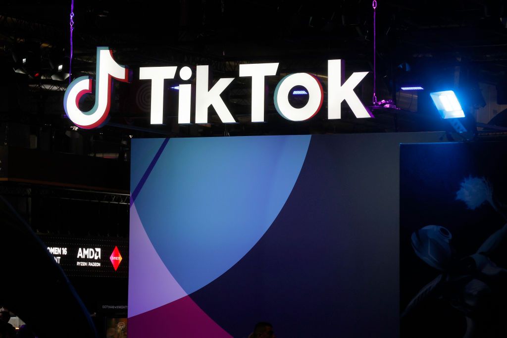 PARIS, FRANCE - NOVEMBER 03: The logo of the mobile video sharing and social networking application TikTok, developed by the Chinese company ByteDance is displayed during Paris Games Week 2022 at Parc des Expositions Porte de Versailles on November 03, 2022 in Paris, France. After two years of absence linked to the Covid-19 pandemic, Paris Games Week is making a comeback in Paris. The event celebrating video games and esports will be held from November 2 to 6, 2022. (Photo by Chesnot/Getty Images)