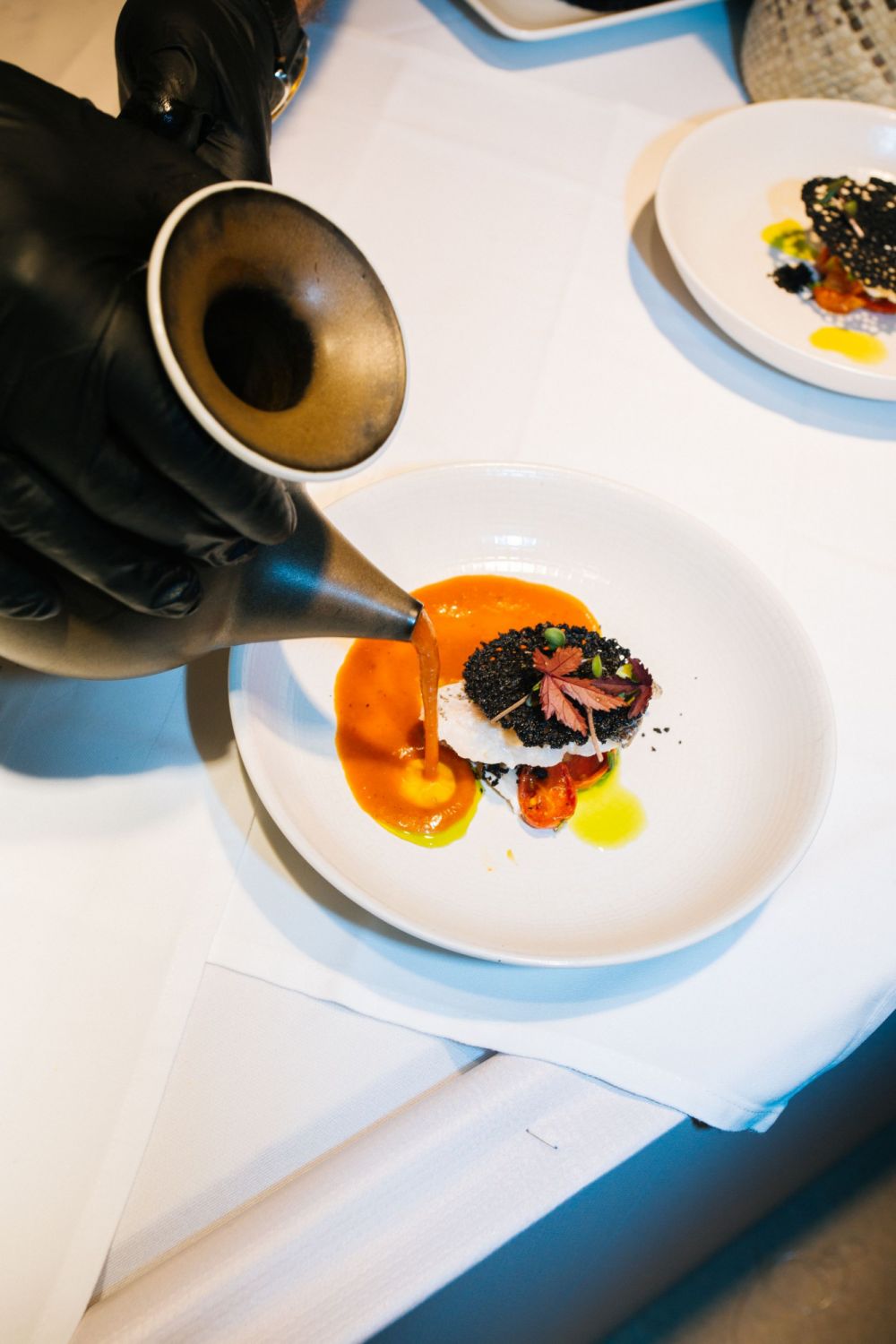 The assam pedas acqua pazza was served with a sauce that gave the dish its kick