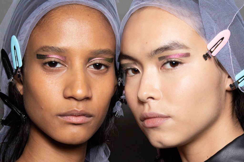 MILAN, ITALY - FEBRUARY 20: (L-R) A model and Model Maryel Uchida is seen backstage at the Prada fashion show on February 20, 2020 in Milan, Italy. (Photo by Rosdiana Ciaravolo/Getty Images)