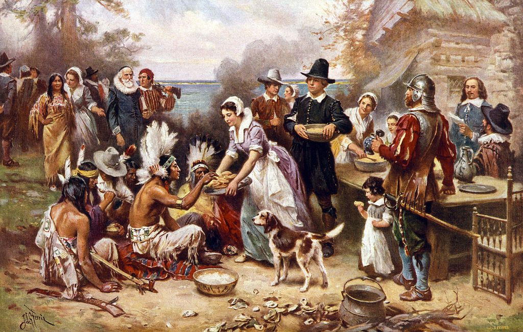 The First Thanksgiving in 1621, after a painting by Jean Leon Gerome; screen print, 1932. (Photo by GraphicaArtis/Getty Images)