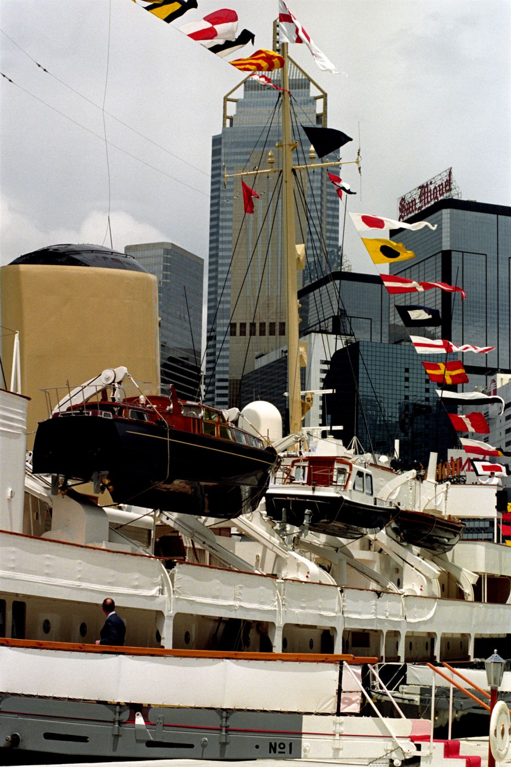 The Prince of Wales, boards the Royal Yacht Britannia this afternoon (Saturday) and studies the skyline in Hong Kong harbour, after his arrival in the far east, for the hand over to Chinese rule on Mondayat midnight. PHOTOGRAPH BY JOHN STILLWELL/PA. (Photo by John Stillwell - PA Images/PA Images via Getty Images)