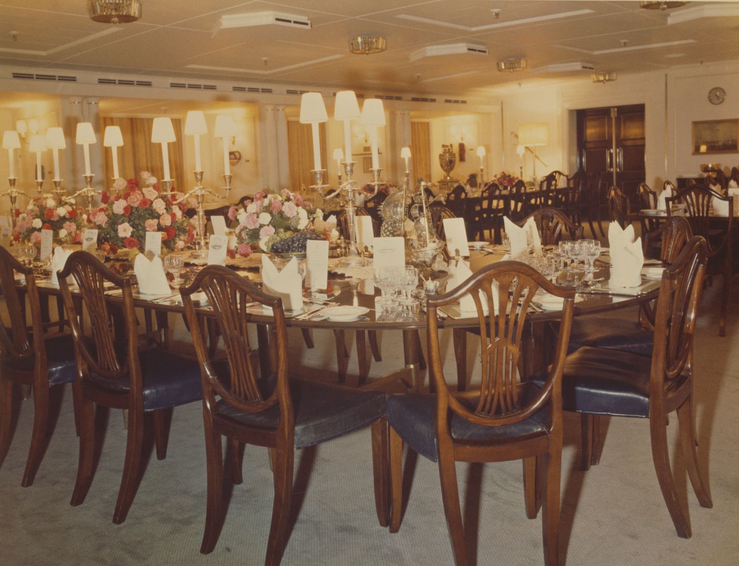 The Dining Room set for dinner on the Royal Yacht Britannia, 1981. (Photo by Central Press/Hulton Archive/Getty Images)