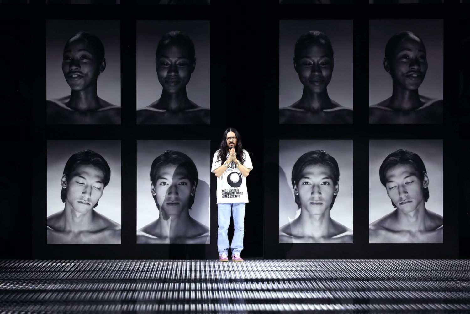MILAN, ITALY - SEPTEMBER 23: Fashion Designer Alessandro Michele acknowledges the applause of the audience during the Gucci Twinsburg Show during Milan Fashion Week Spring/Summer 2023 on September 23, 2022 in Milan, Italy. (Photo by Daniele Venturelli/Getty Images for Gucci)