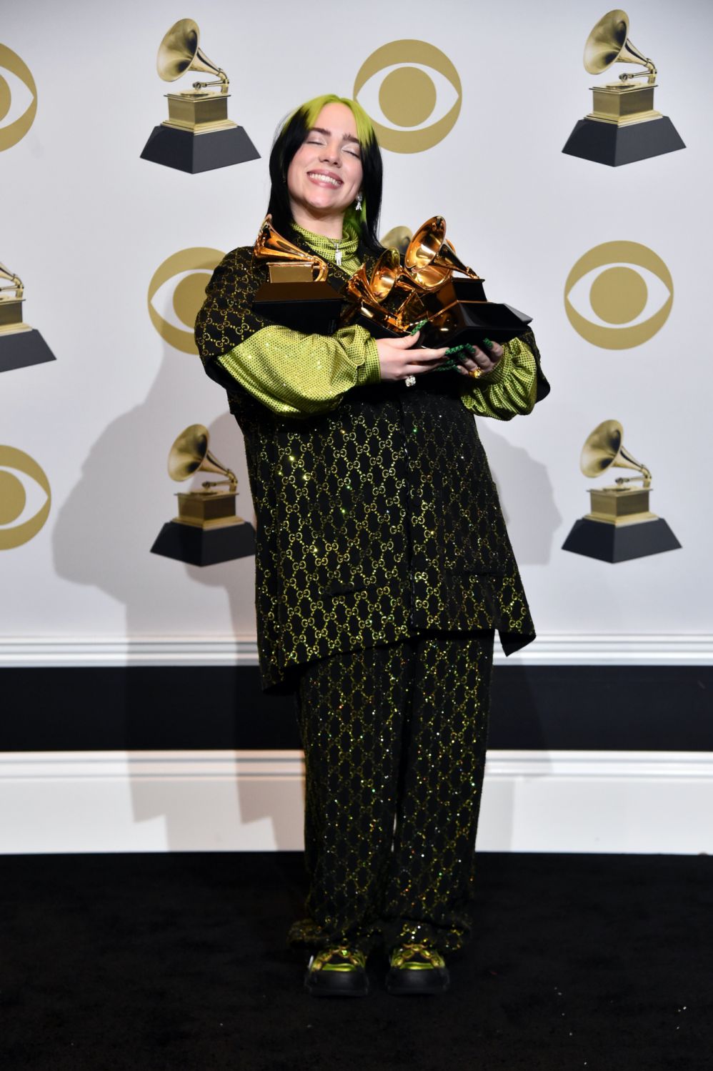 LOS ANGELES, CALIFORNIA - JANUARY 26: Billie Eilish, winner of Record of the Year for "Bad Guy", Album of the Year for "when we all fall asleep, where do we go?", Song of the Year for "Bad Guy", Best New Artist and Best Pop Vocal Album for "when we all fall asleep, where do we go?", poses in the press room during the 62nd Annual GRAMMY Awards at STAPLES Center on January 26, 2020 in Los Angeles, California. (Photo by Alberto E. Rodriguez/Getty Images for The Recording Academy)