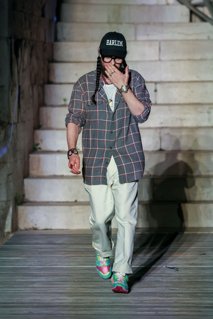 CASTEL DEL MONTE, ITALY - MAY 16 Designer Alessandro Michele aknowledges the applause of the public during Gucci Cosmogonie at Castel Del Monte on May 16, 2022 in Andria, Italy. (Photo by Daniele Venturelli/Getty Images for Gucci)