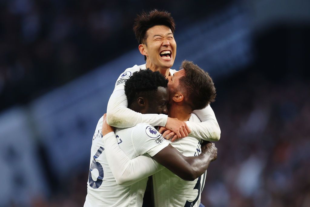 LONDON, ENGLAND - MAY 12: Heung-Min Son, Davinson Sanchez and Rodrigo Bentancur of Tottenham Hotspur celebrate their side's second goal scored by Harry Kane of Tottenham Hotspur during the Premier League match between Tottenham Hotspur and Arsenal at Tottenham Hotspur Stadium on May 12, 2022 in London, England. (Photo by Tottenham Hotspur FC/Tottenham Hotspur FC via Getty Images)