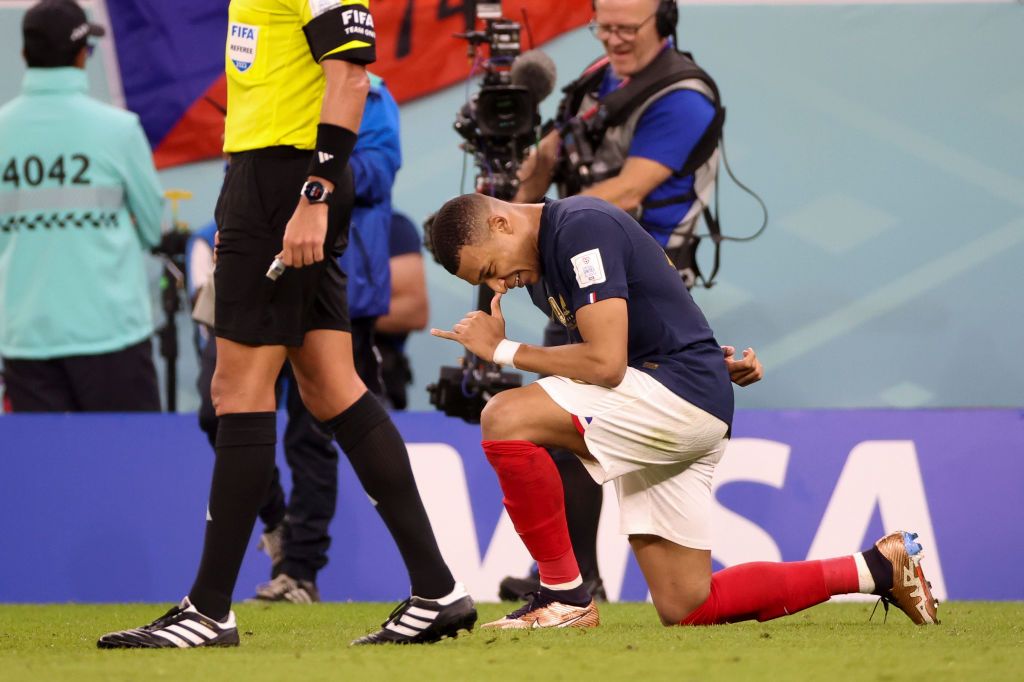 DOHA, QATAR - DECEMBER 4: Kylian Mbappe of France celebrates his first goal during the FIFA World Cup Qatar 2022 Round of 16 match between France and Poland at Al Thumama Stadium on December 4, 2022 in Doha, Qatar. (Photo by Jean Catuffe/Getty Images)
