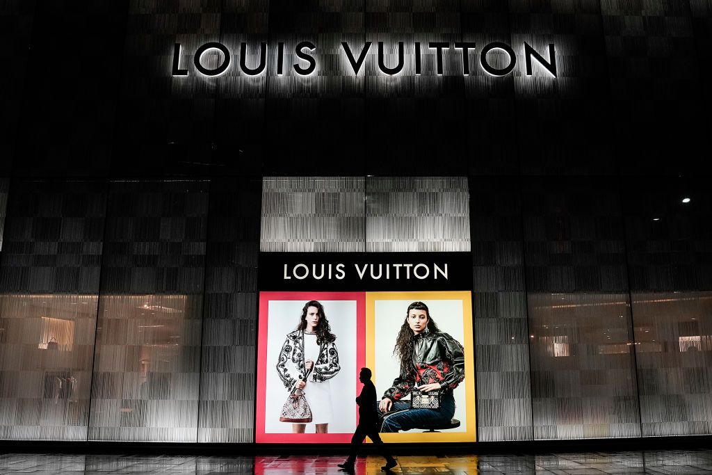 WUHAN, CHINA - OCTOBER 30:  (CHINA OUT) The man walk in front of stone during new Louis Vuitton traveling exhibition "SEE LV" Opening ceremony at Wuhan International Plaza on October 30, 2020 in Wuhan, Hubei province, China. Wuhan is the first stop of the global tour. As there have been no recorded cases of Covid-19 community transmissions since May, life for residents is gradually returning to normal. (Photo by Getty Images)