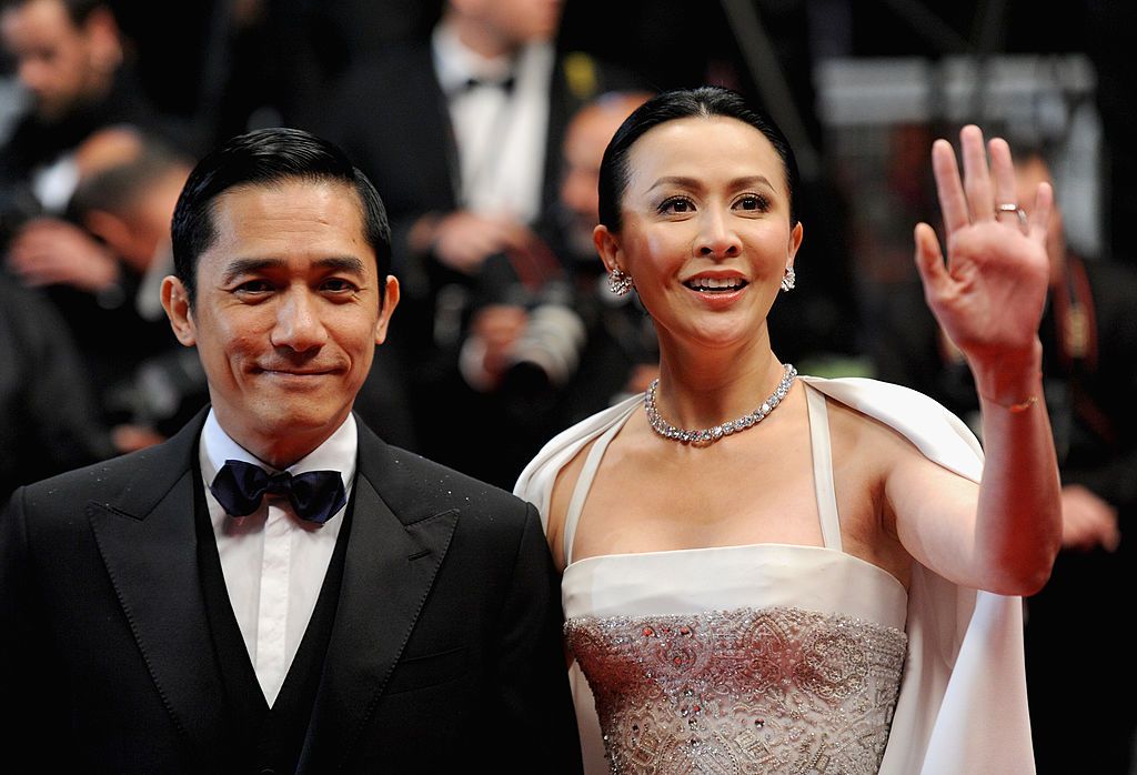 CANNES, FRANCE - MAY 18: Actor Tony Leung and actress Carina Lau attend the 'Bends' Premiere during The 66th Annual Cannes Film Festival at the Palais des festivals on May 18, 2013 in Cannes, France. (Photo by Dave J Hogan/Getty Images)