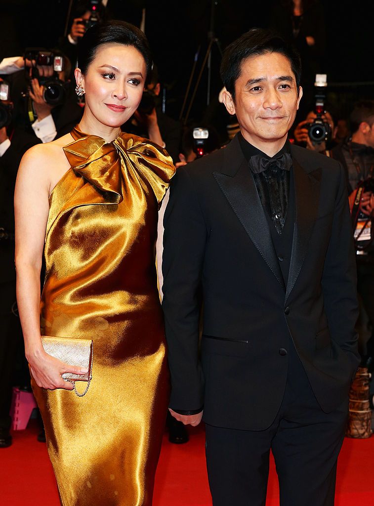 CANNES, FRANCE - MAY 17: Carina Lau and Tony Leung attend the Premiere of 'Tian Zhu Ding' (A Touch of Sin) during The 66th Annual Cannes Film Festival at Palais des Festivals on May 17, 2013 in Cannes, France. (Photo by Andreas Rentz/Getty Images)
