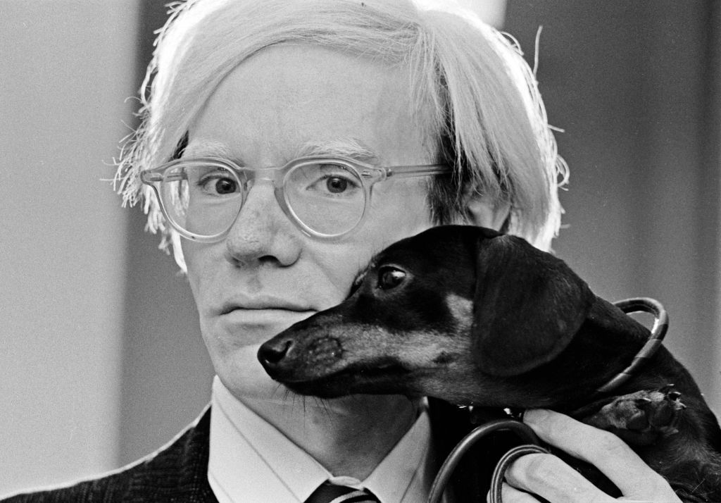 Andy Warhol poses with his beloved dachshund Archie in November 1973. (Photo by Jack Mitchell/Getty Images)
