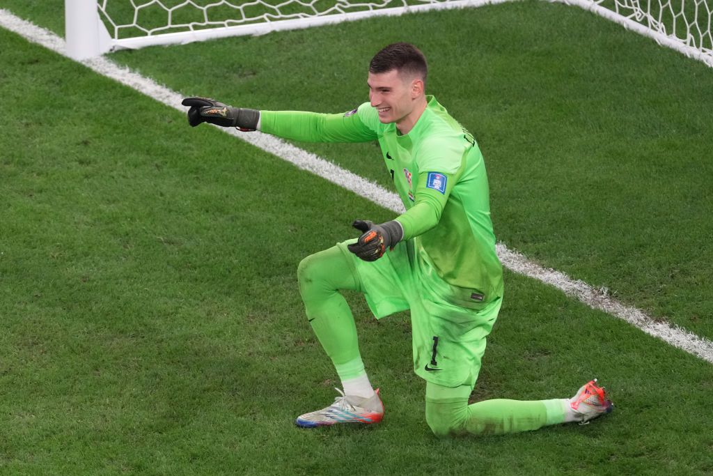 AL RAYYAN, QATAR - DECEMBER 09: Dominik Livakovic of Croatia celebrates the victory at the end of the penalty shoot out during the FIFA World Cup Qatar 2022 quarter final match between Croatia and Brazil at Education City Stadium on December 09, 2022 in Al Rayyan, Qatar. (Photo by Etsuo Hara/Getty Images)
