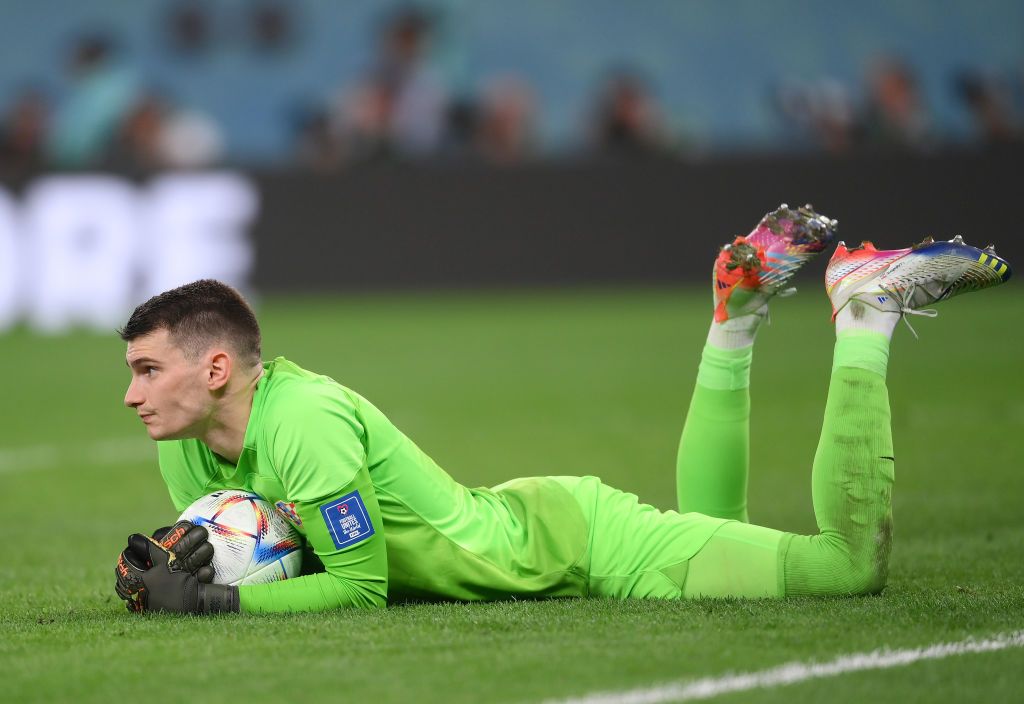 AL RAYYAN, QATAR - DECEMBER 09: Dominik Livakovic of Croatia recovers after making a save during the FIFA World Cup Qatar 2022 quarter final match between Croatia and Brazil at Education City Stadium on December 09, 2022 in Al Rayyan, Qatar. (Photo by Laurence Griffiths/Getty Images)