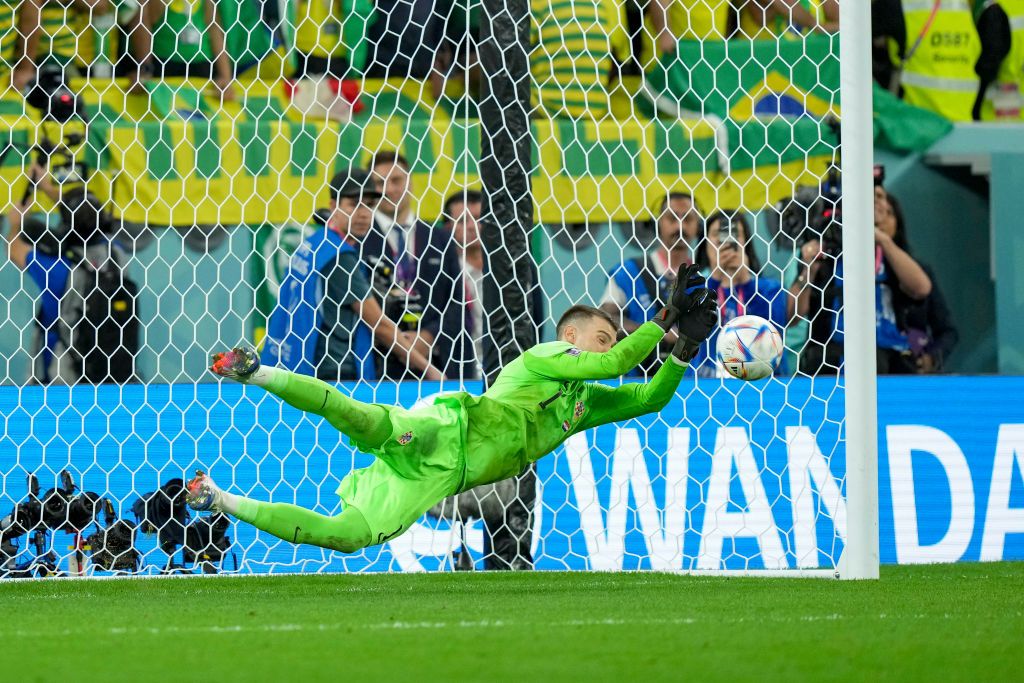 AL RAYYAN, QATAR - DECEMBER 09: goalkeeper Dominik Livakovic of Croatia Holds penalty during the FIFA World Cup Qatar 2022 quarter final match between Croatia and Brazil at Education City Stadium on December 9, 2022 in Al Rayyan, Qatar. (Photo by Mohammad Karamali/DeFodi Images via Getty Images)