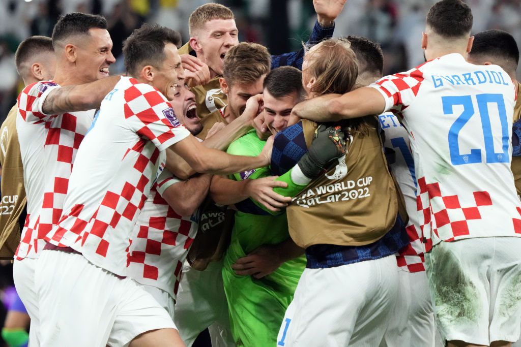 AL RAYYAN, QATAR - DECEMBER 09: Dominik Livakovic of Croatia celebrates the win via a penalty shootout during the FIFA World Cup Qatar 2022 quarter final match between Croatia and Brazil at Education City Stadium on December 09, 2022 in Al Rayyan, Qatar. (Photo by Koji Watanabe/Getty Images)