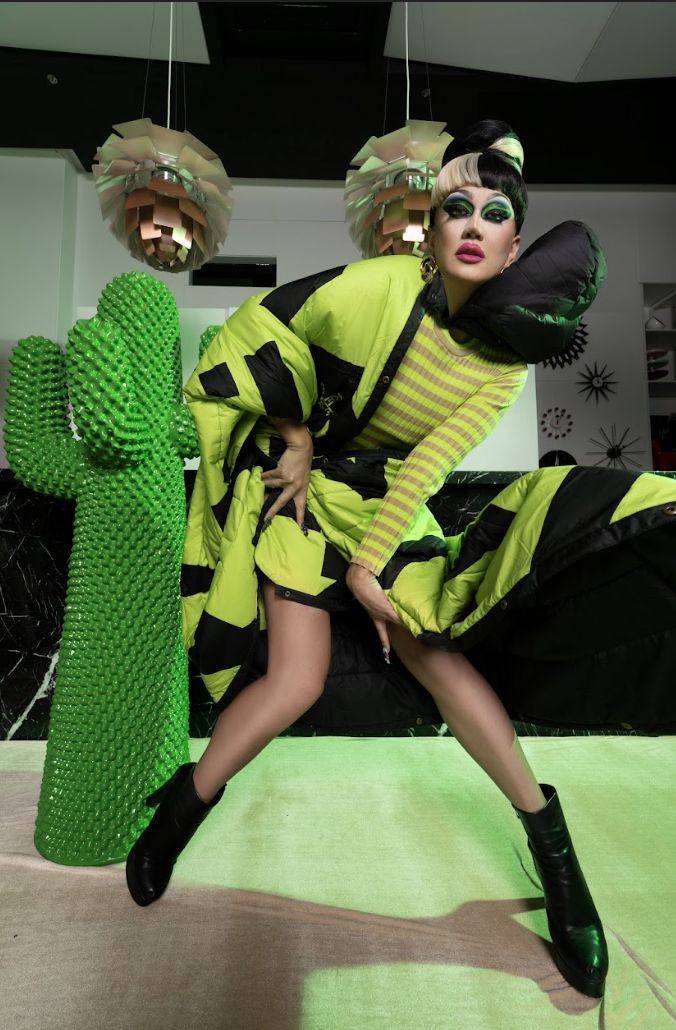 Luzon in Kenzo sports blanket and blazer, beside Another Green Cactus by Gufram (CWC Interiors)