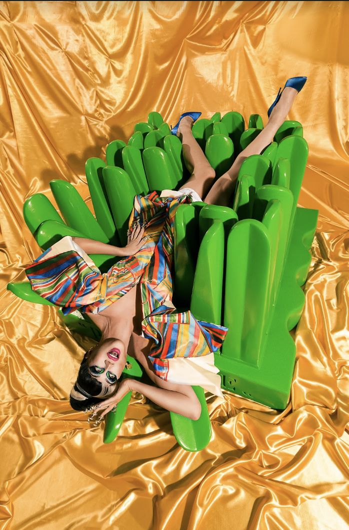 She wears Mara Chua Divisoria Bayong digiprint sculpted dress and Elinails spiral nails as she poses with Gufram’s Pratone