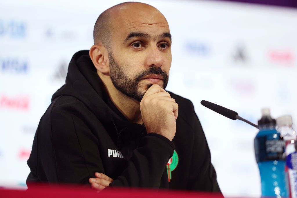 DOHA, QATAR - DECEMBER 13: Walid Regragui, Head Coach of Morocco, speaks during the Morocco Press Conference at the Main Media Center on December 13, 2022 in Doha, Qatar. (Photo by Mohamed Farag/Getty Images)