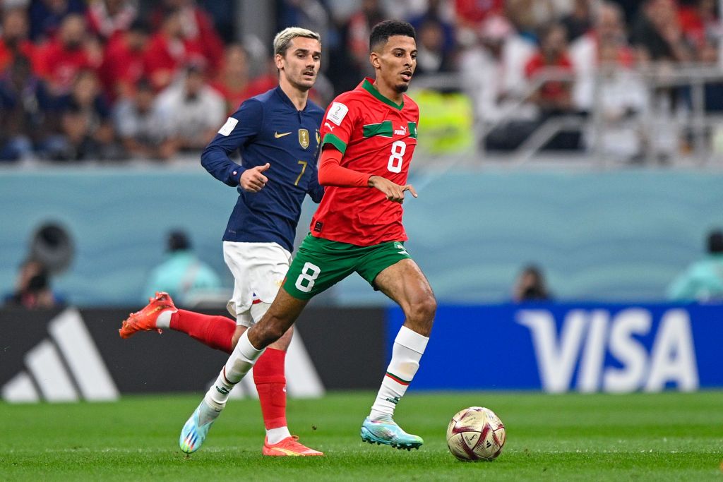 AL KHOR, QATAR - DECEMBER 14: Azzedine Ounahi of Morocco battles for the ball with Antoine Griezmann of France during the Semi Final - FIFA World Cup Qatar 2022 match between France and Morocco at the Al Bayt Stadium on December 14, 2022 in Al Khor, Qatar (Photo by Pablo Morano/BSR Agency/Getty Images)