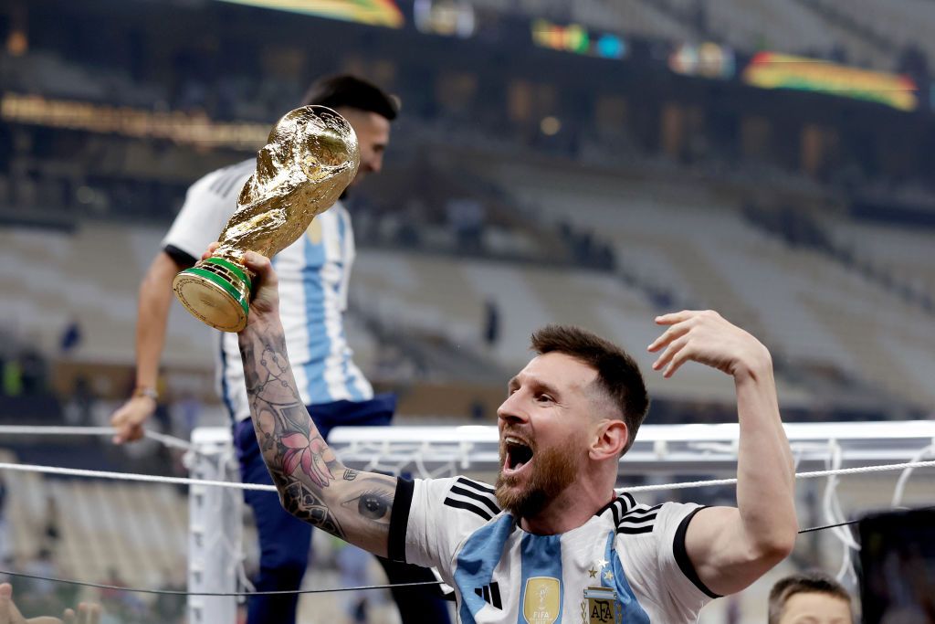 LUSAIL CITY, QATAR - DECEMBER 18: Lionel Messi of Argentina celebrating with the World Cup trophy during the World Cup match between Argentina v France at the Lusail Stadium on December 18, 2022 in Lusail City Qatar (Photo by Eric Verhoeven/Soccrates/Getty Images)