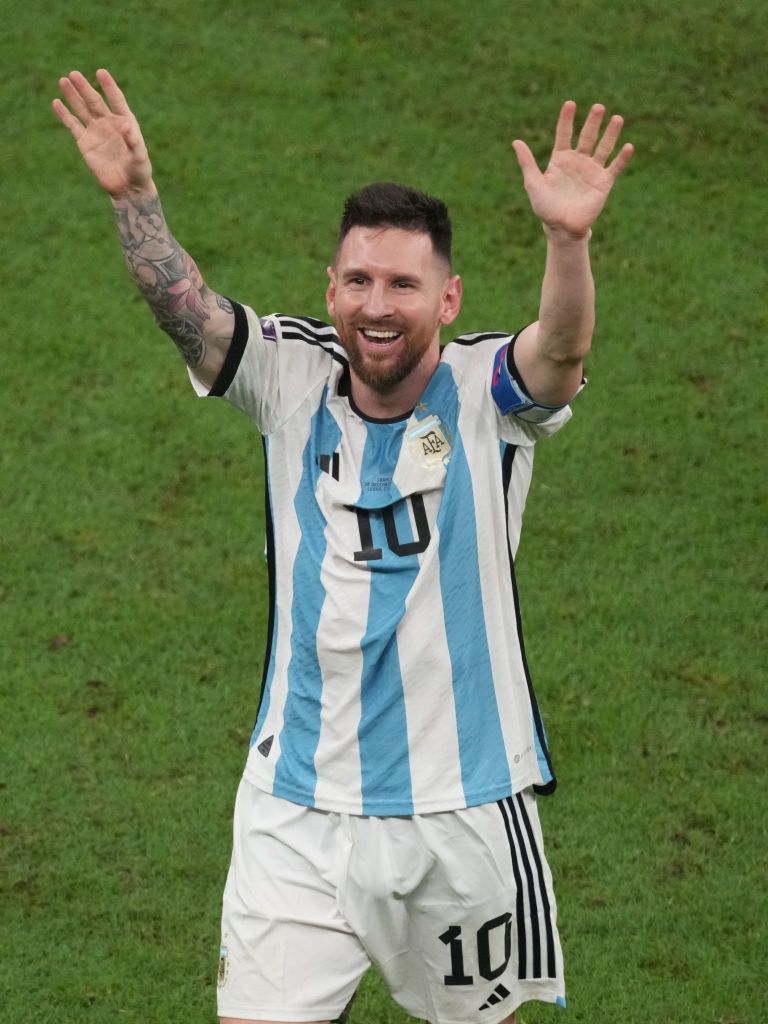 LUSAIL CITY, QATAR - DECEMBER 18: Lionel Messi of Argentina celebrates the victory at the end of the penalty shoot out in the FIFA World Cup Qatar 2022 Final match between Argentina and France at Lusail Stadium on December 18, 2022 in Lusail City, Qatar. (Photo by Etsuo Hara/Getty Images)