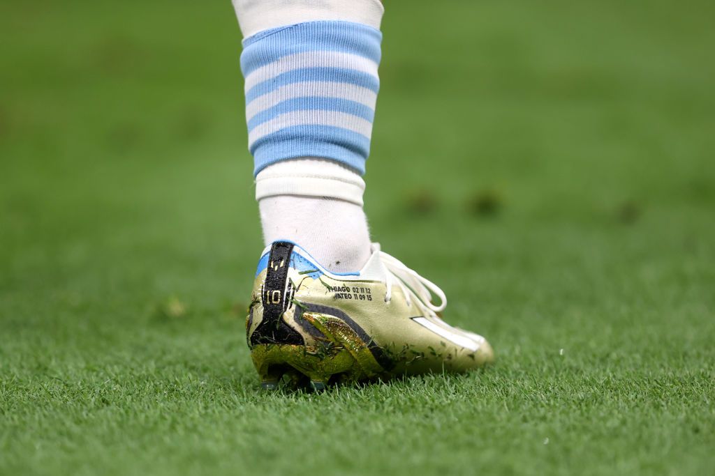 LUSAIL CITY, QATAR - DECEMBER 18: The boots of Lionel Messi of Argentina are seen prior to the FIFA World Cup Qatar 2022 Final match between Argentina and France at Lusail Stadium on December 18, 2022 in Lusail City, Qatar. (Photo by Julian Finney/Getty Images)