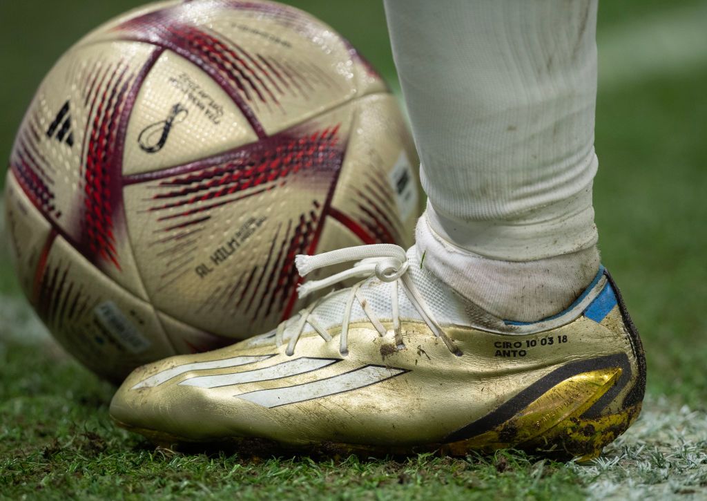 LUSAIL CITY, QATAR - DECEMBER 18: The boots of Lionel Messi of Argentina during the FIFA World Cup Qatar 2022 Final match between Argentina and France at Lusail Stadium on December 18, 2022 in Lusail City, Qatar. (Photo by Visionhaus/Getty Images)