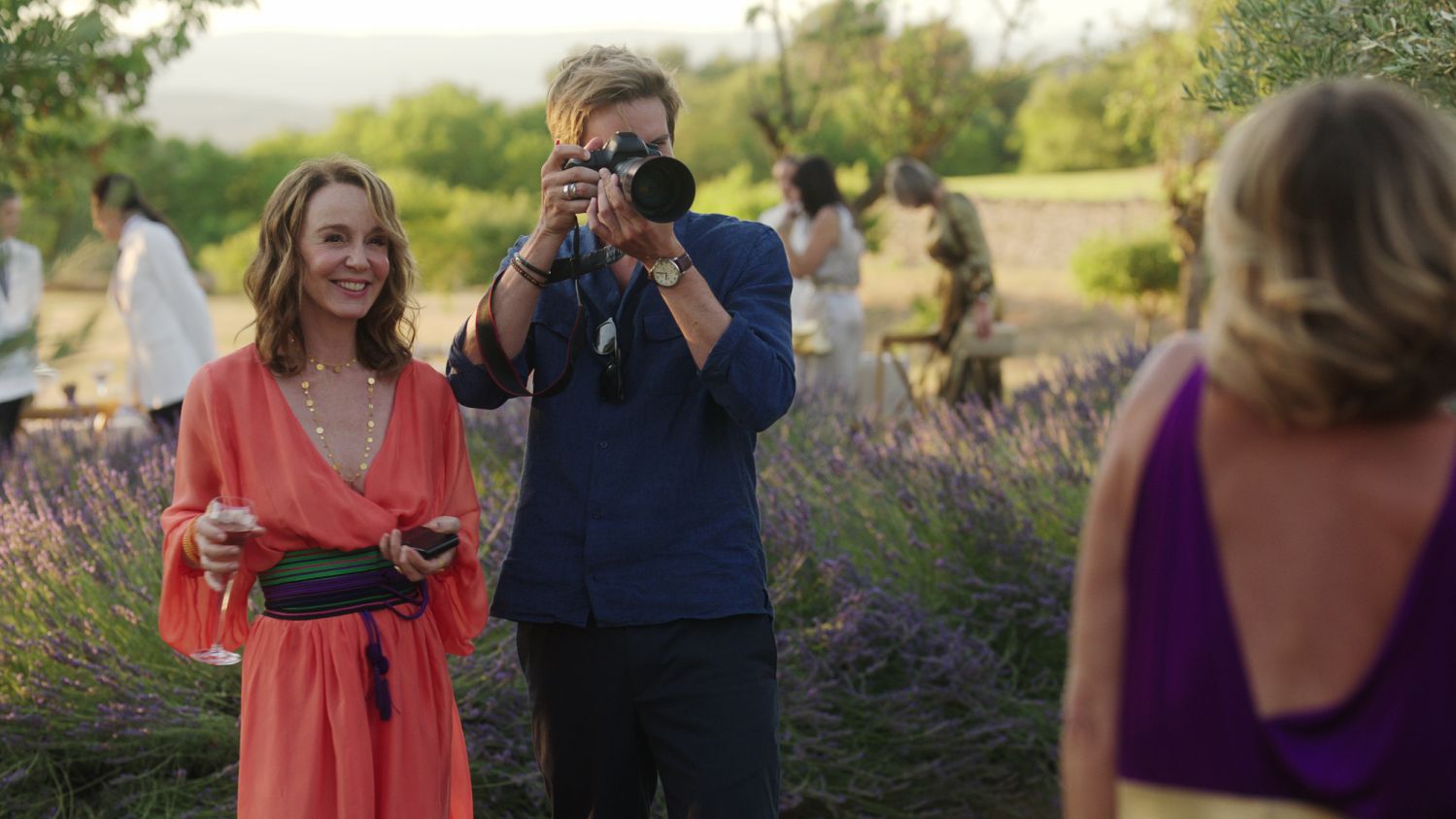 Emily in Paris. (L to R) Philippine Leroy-Beaulieu as Sylvie Grateau, Søren Bregendal as Erik De Groot in episode 306 of Emily in Paris. Cr. Courtesy of Netflix © 2022