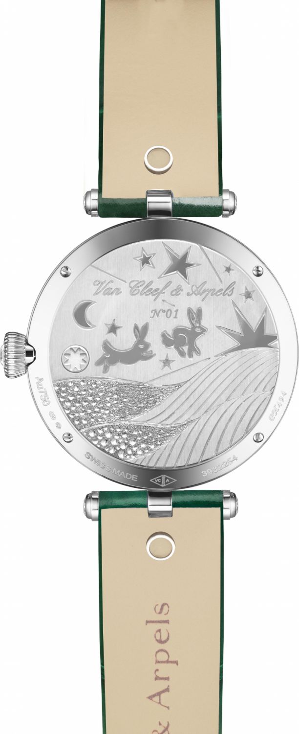 Extraordinary Dials Collection, Lady Duo de Lapins watch. 33mm white gold case; white gold bezel, round diamonds; foreground white mother-of-pearl rabbits, miniature painting, lacquer, rose gold ground, round pink sapphires, round emeralds, white gold trees, plique-à -jour enamel; background clouds in lapis lazuli marquetry, guilloché rose gold sun; white gold crown, round diamond; two interchangeable shiny alligator straps, one green and a second color to choose from the offer available in boutique; inter