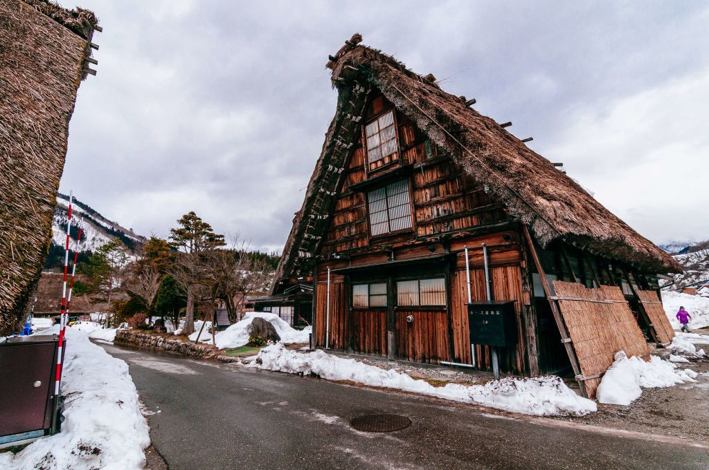 SHIRAKAWA, GIFU PREFECTURE, SHOGAWA RIVER VALLEY, JAPAN - 2017/03/02: Traditional thatched roof farmhouse in Ogimachi village in Shirakawa-go. (Photo by Raquel Maria Carbonell Pagola/LightRocket via Getty Images)
